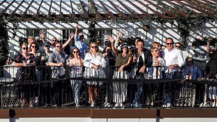 Visit People on a balcony