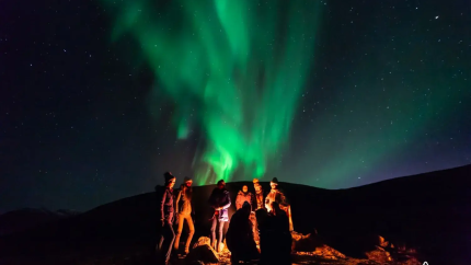 Northern Lights over a fire pit